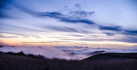 sunset over the clouds 
