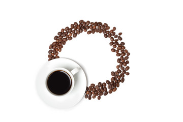 White cup of coffee and coffee beans frame