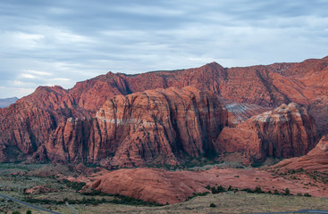 Snow Canyon State Park red sandstone mountains under a blanket of clouds in Utah