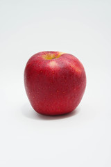 red apple fruit on white background