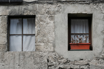 old window in stone wall