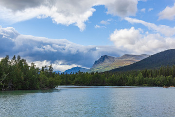 Fototapeta na wymiar Impressive view of the mountains of Sarek national park in Swedish Lapland.