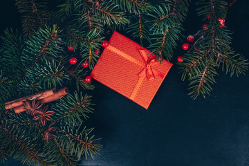 Red Christmas present with bow and ribbon. Christmas background. Christmas gift box.