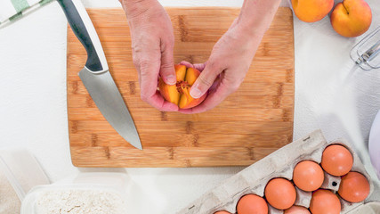 Baking Cake with Dough Recipe Ingredients and Fresh Peaches. Top View, White Background