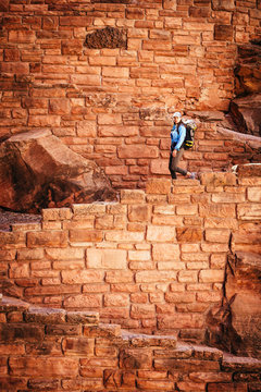 After hiking to Angels Landing, a woman descends Walter's Wiggles, Zion National Park.