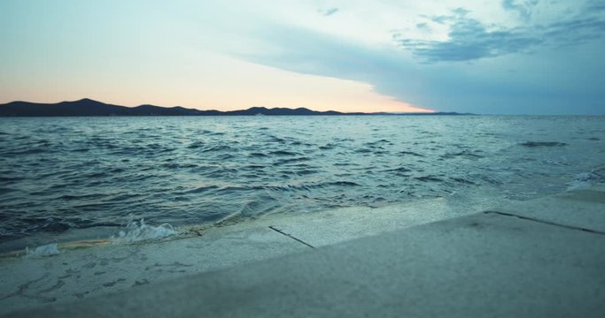 the sea after sunset with georgeous sky