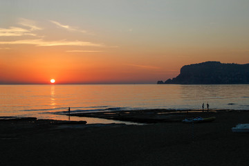 silhouette of alanya city at sunset