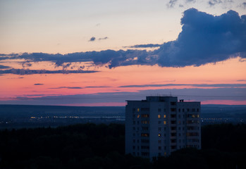 Fototapeta premium Building in the town outskirts at dusk. House