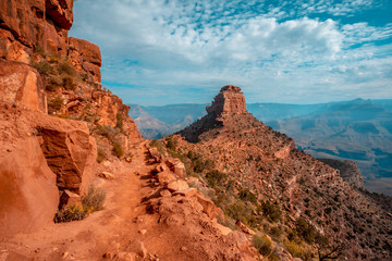 Panoramic of the beautiful descent of the South Kaibab Trailhead with a mountain in the background. Grand Canyon, Arizona
