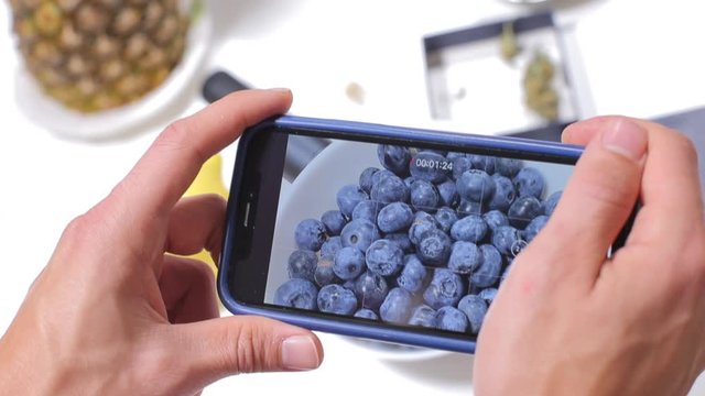smartphone screen, shooting a video blueberry