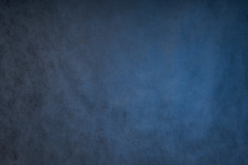 blue grey abstract background, the Studio wall is illuminated by constant light