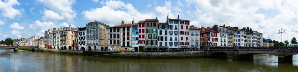 Fototapeta premium Panorama of Bayonne embankment on Nive river