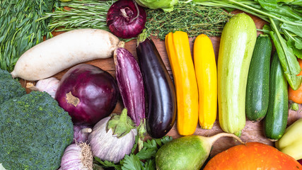 various zucchini and other vegetables on table