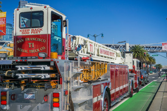 October 7, 2017 San Francisco/CA/USA - Firefighter engine driving on the Embarcadero road during fleet week