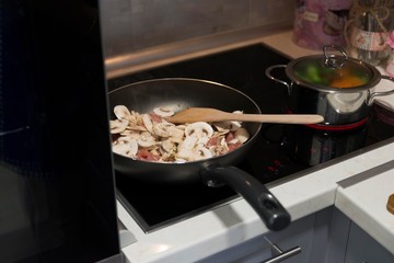 cooking food in pan