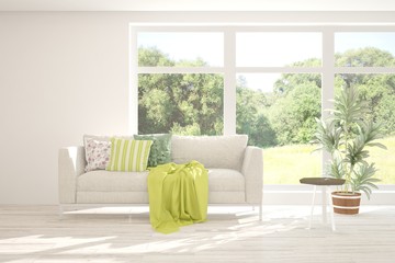 Stylish room in white color with sofa and summer landscape in window. Scandinavian interior design. 3D illustration