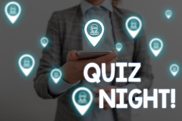 Handwriting text writing Quiz Night. Conceptual photo evening test knowledge competition between individuals Woman wear formal work suit presenting presentation using smart device
