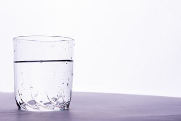 glass of water on a white background