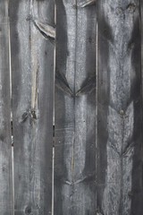 Obraz na płótnie Canvas Closeup of old barn door with old desks