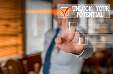 Word writing text Unlock Your Potential. Business photo showcasing release possibilities Education and good training is key Woman standing Looking camera showing pointing the copy space bullet points