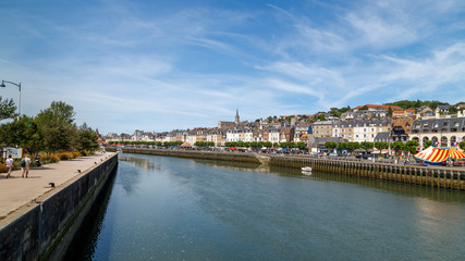 Fototapeta na wymiar Beautiful panorama of Touques river waterfronts with stunning views of the historic architecture of Trouville, Normandy, France.