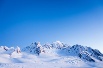 New Zealand, Otago, Westland Tai Poutini National Park. Mount Haast, Mount Lendenfeld and Mount Tasman at dusk in winter.