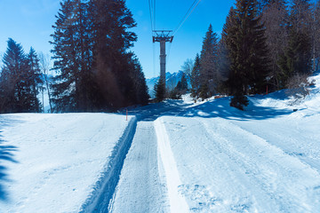 Mount Rigi cable lift terminal station in spring. Mount Pilatus in the background