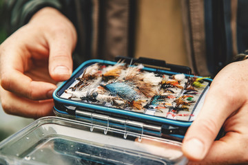 Box flies for fly fishing in hand fisher