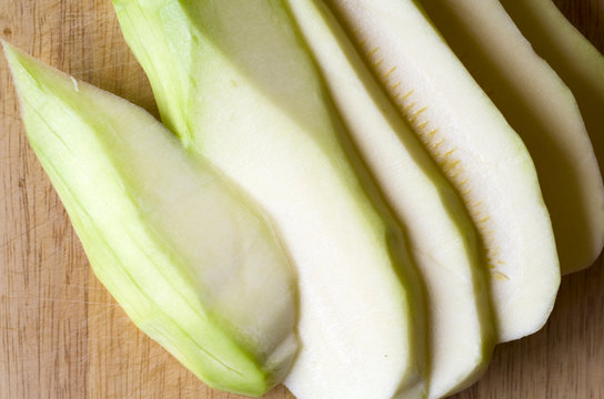 sliced zukkini on a chopping board