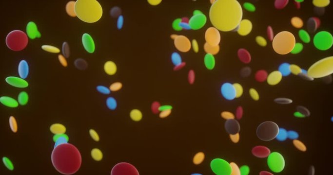 Famous colorful flat sphere chocolates falling in super slowmotion. 3D Rendering. Chocolate concept.