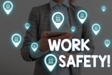 Handwriting text writing Work Safety. Conceptual photo policies and procedures in place to ensure health of employees Woman wear formal work suit presenting presentation using smart device