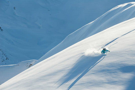 Austria, Woman skiing on snow covered Arlberg mountain
