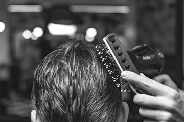 Men's haircut and barbershop styling.