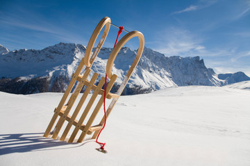 Switzerland, Graubuenden, Savognin, Winter scenery with sledge
