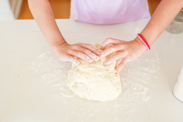 Obraz na płótnie Canvas Hand Kneading Dough