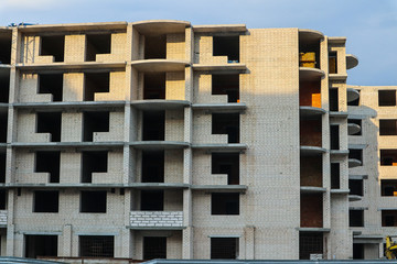 Unfinished cement building at construction site