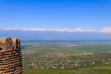 View on Alazani valley and tower of old city wall in city Sighnaghi, Kakheti, Georgia