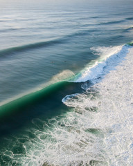 waves perfectly barrelling  during a cyclone storm  on the gold coast australia