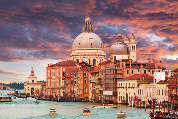 Naklejka premium Sunset on Canal Grande with Basilica Santa Maria della Salute in the Venice, Italy