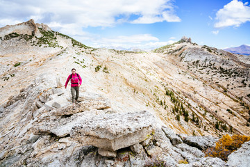 USA, California, Yosemite National Park, a woman is hiking near Echo Peaks.