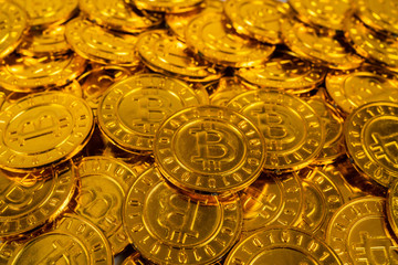 big pile of Bitcoin coins