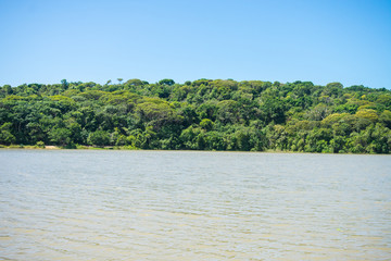 Fototapeta na wymiar Lagoa da Mata, beautiful lagoon surrounded by preserved Atlantic Forest on Itamaraca island, Brazil