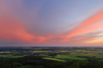 Aerial drone photography of a lake landscape during sunset. Beautiful and calm rural landscape. 