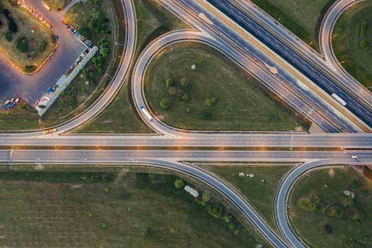 Aerial drone photography of the city suburbs, highway around the main city. 