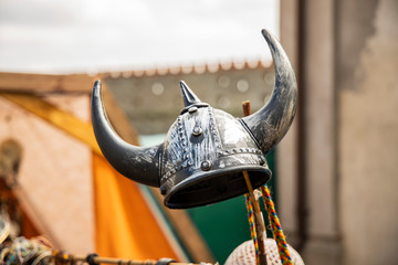 decoration object iron helmet with horns in Scandinavian north European style on some medieval...