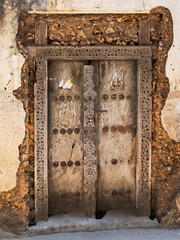 old wooden door in stonetown, zanzibar
