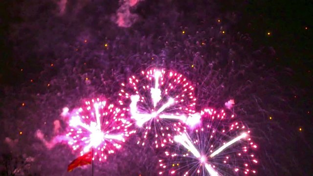 Colorful fireworks display at holiday night 4k