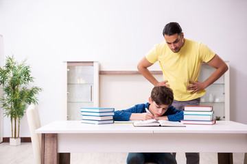 Father helping his son to prepare for school