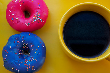 still life with donuts and a cup of coffee