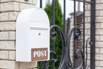 New white mailbox in street